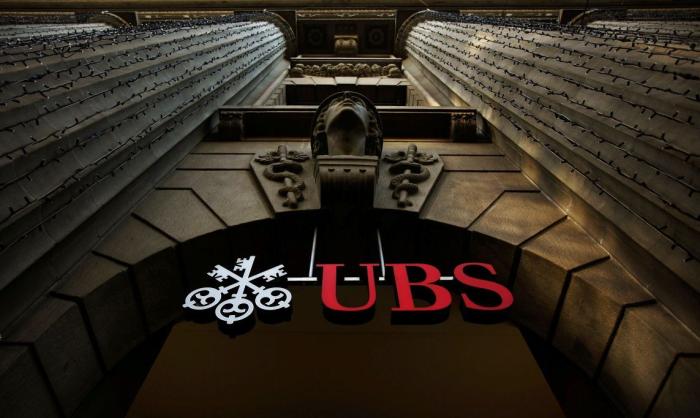Консорциум UBS был создан 15 сентября 2015 года девятью финансовыми компаниями: Barclays, BBVA, Commonwealth Bank of Australia, Credit Suisse, Goldman Sachs,J.P. Morgan & Co., Королевский банк Шотландии, State Street Corporation, UBS