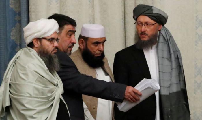 Делегация талибов на переговорах с американцами. Фото Reuters