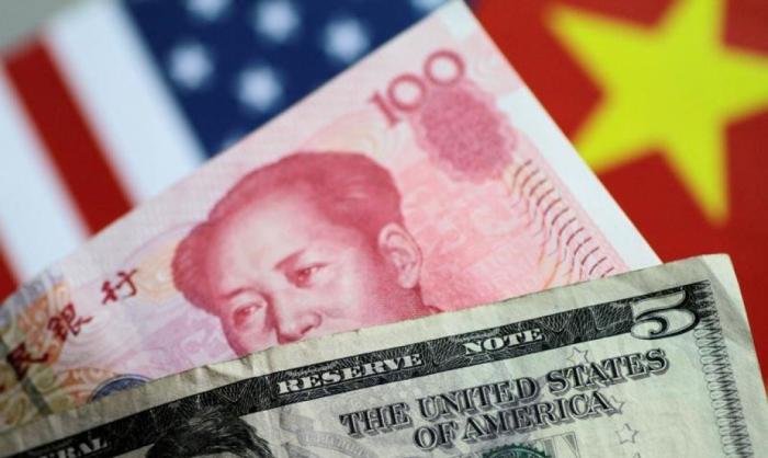 Китайская экономика по-прежнему зависит от американского доллара