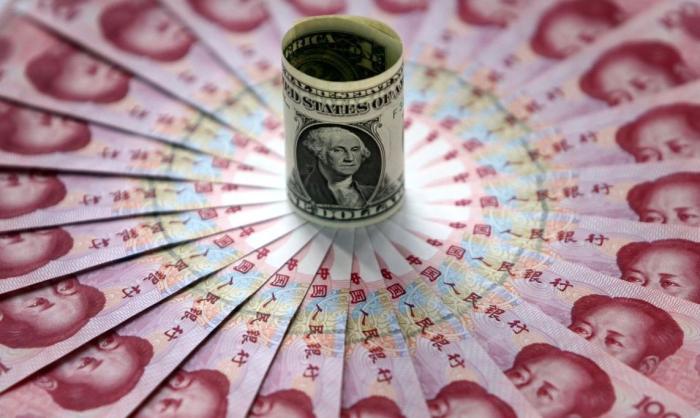 Гораздо большее, чем Россия, содействуют возвышению китайской валюты США